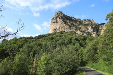 Country road leading towards Pic de Bugarach, the highest peak in the Corbieres mountain range in Aude department, southern France