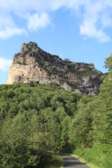 Country road leading towards Pic de Bugarach, the highest peak in the Corbieres mountain range in Aude department, southern France
