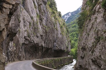 Road alongside Aude river bordered by Gorges de Saint Georges, a gorge located near the town of Axat in Aude department, southern France 
