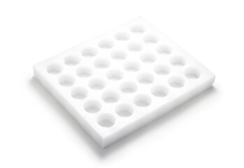 Empty egg tray isolated on white background