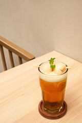Lychee iced tea with mint leaves
