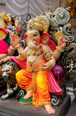 Indian Hindu God Lord Ganesha Statues made of clay and soil, Coated with color sold for Ganesh Chathurthi