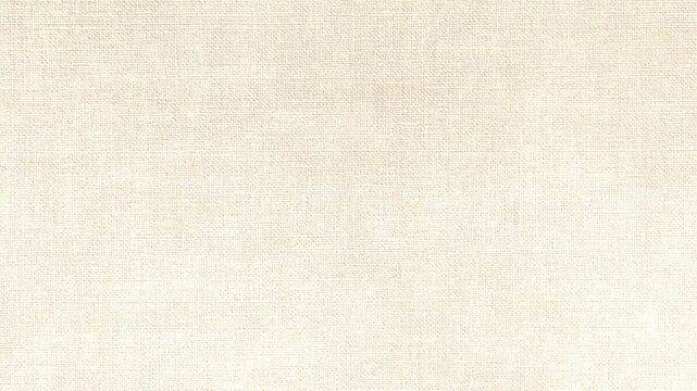 video footage of the surface texture fibers of a cream white cotton cloth moving slowly
