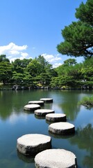 Fototapeta premium A beautiful Japanese garden exhibits a stone path gracefully meandering over a tranquil pond, bordered by vibrant plants and serene landscaping that invites relaxation.