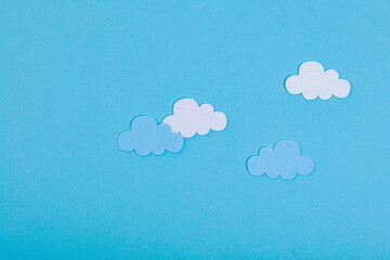 Weather symbols concept. Crocheted sun, clouds and moon. Handmade props, hobby, crafted decor