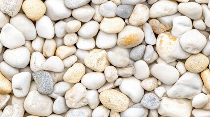 A close-up view displays a variety of small, smooth white pebbles arranged on a natural stone surface, showcasing intricate textures and natural lighting for a crisp appearance SEAMLESS PATTERN