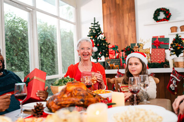 Merry Christmas Celebration, Happy Family Gather Together for Festive Holiday Party at Home, Enjoying Fun and Delicious Food, Smiling Children and Adults, Winter Joy Dinner in the New Year