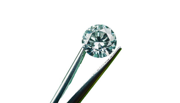 round diamond in tweezers on green background