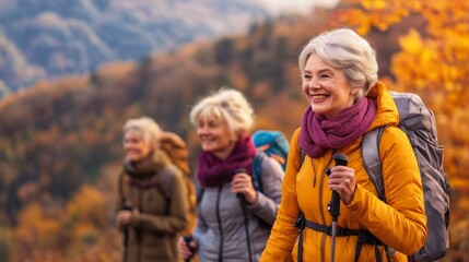 Elderly women hiking in autumn forest, vibrant fall foliage and adventure.