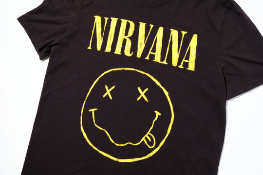 Kent, uk 01.01.2024 official nirvana happy face smiley face nirvana band merchandise tshirt large 1990s Kurt Cobain grunge rock. Seattle grunge era music tshirt merchandise.