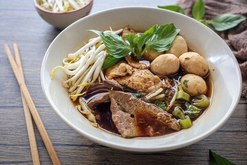 Noodle soup with sliced pork, pig blood, bean sprouts and Thai morning glory., thai called Kway Tiew Moo Nam Tok