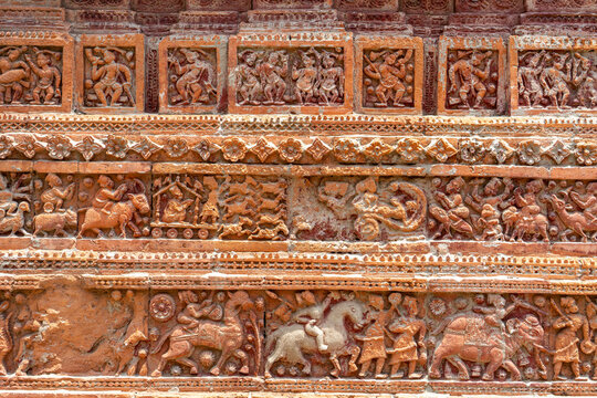 Closeup view of carved terracotta on ancient Govinda temple in Puthia religious complex, Rajshahi, Bangladesh.