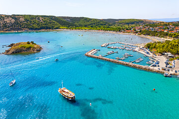 Croatia, sand beach on the island Rab view from drone. Adriatic Sea with turquoise water, marina near Lopar town © TatiG