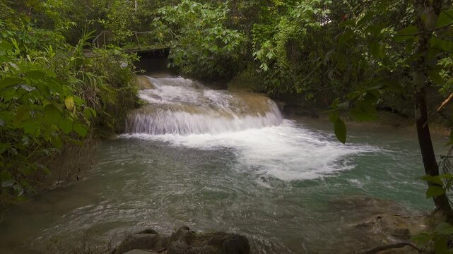 Small cascade in El Nicho waterfalls in Cuba, deep forest