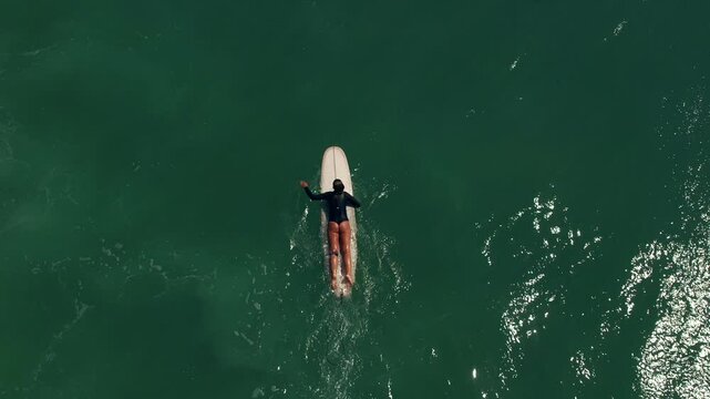 Surfing man girl people swimming ocean  