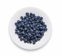 Round plate with wet blueberries isolated on white. View from above. Health concept. Weight loss.