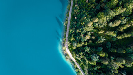 Exploring the tranquil beauty of Plansee, Austria with stunning turquoise waters and lush landscapes
