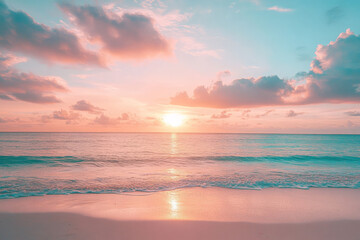 Fototapeta premium Serene sunset over a calm ocean with pink and blue sky and soft waves on the beach.