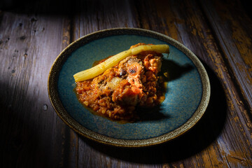 Coda alla vaccinara or oxtail stew is a typical dish of the traditional cuisine of Rome and Lazio in Italy