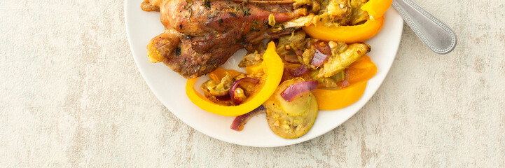 Savor a fulfilling breakfast or lunch with savory baked turkey, roasted zucchini, sweet peppers, and onions, banner