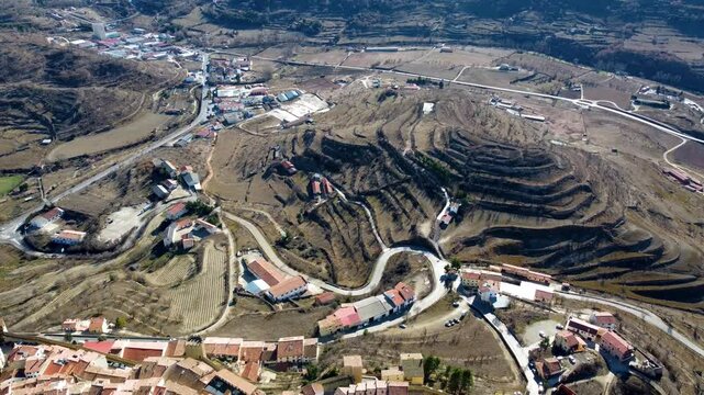 Stunning 4K drone footage of Ares del Maestre. Discover breathtaking aerial views of this picturesque village and its historic hilltop castle in the Spanish countryside