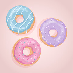 Colorful donuts on pink background. 