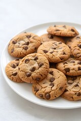 A plate of fresh warm cookies on a minimalist white table   AI generated illustration