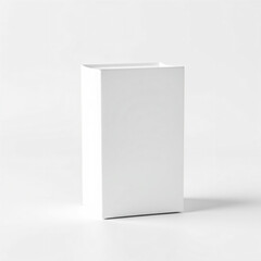 Naklejka premium a blank white box mockup displayed on a smooth white background