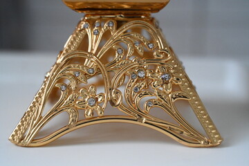antique golden incense burner engraved with small diamonds 