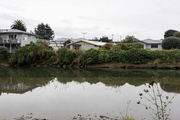Building around the river with reflection.