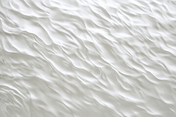 Obraz premium A light white textured surface with a subtle, rippled effect, mimicking the gentle undulations of a serene water surface.