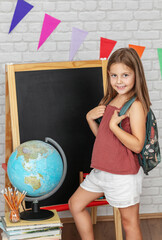 Girl  posing for the first day at school
