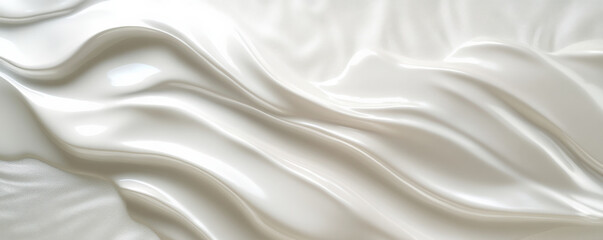 Obraz premium A light white textured surface with a smooth, glossy finish, accented by faint, swirling patterns that create a sense of fluidity.