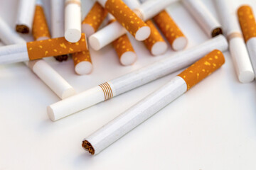 Close up stack of cigarettes on white background. cigarettes isolated on white