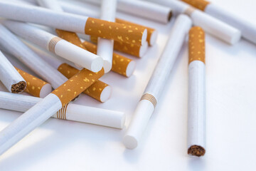 Close up stack of cigarettes on white background. cigarettes isolated on white