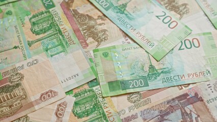 Russian ruble banknotes displayed closely together showcasing various denominations indicating a focus on financial and currency matters.