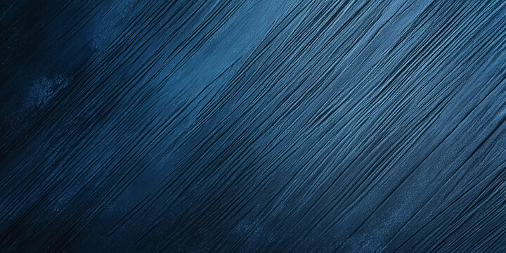A blue textured surface with a soft, brushed finish, showcasing fine, parallel lines that add a soft, linear texture.