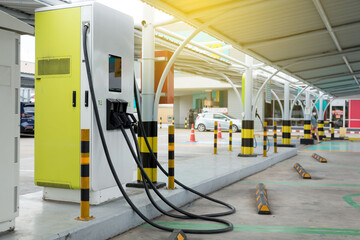 EV charging station. Electric vehicle charger station at car park. Electric car charging station..