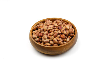 red kidney beans in wooden spoon isolated on white background.