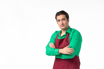 Portrait of a man in an apron on a white background