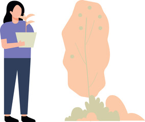 A girl stands by a tree with a plant.