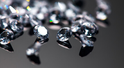 Diamonds on black background, crystals, beautiful shining brilliants sparkling with colorful...
