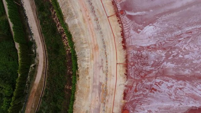 Embalse de Alcoa - Red Mud Pond In Xove, Lugo, Spain. aerial topdown shot