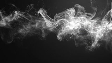 Fototapeta premium Gray smoke swirling against a dark background, creating a mysterious atmosphere.