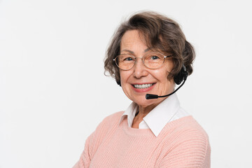 Photo of senior woman female administrator call center worker manager customer support wired...