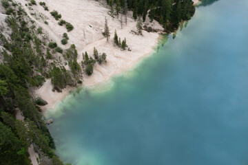 aerial view of the sandy path that runs along the braies leke in trentino alto adige italy