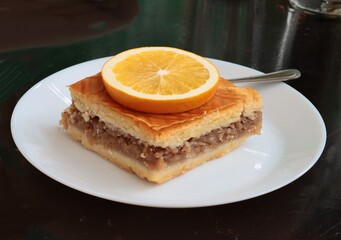 cup of coffee and tasty apple pie in cafe