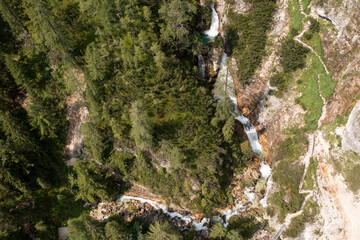 aerial view of waterfalls and trail in val di fanes veneto italy