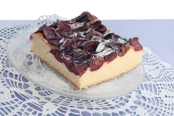 homemade tasty cake with plums close up
