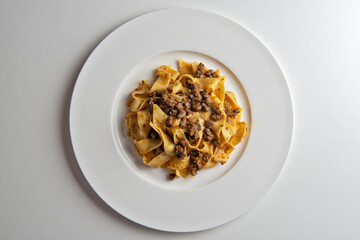 Plate with pappardelle with wild boar ragout sauce
